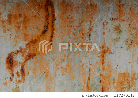 The image is of a rusty metal surface with a greenish tint The image is of a rusty metal surface with a greenish tint 127279112