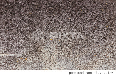 A grey and brown surface with a lot of texture A grey and brown surface with a lot of texture 127279126
