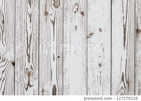 A white wooden board with many holes in it 127279128