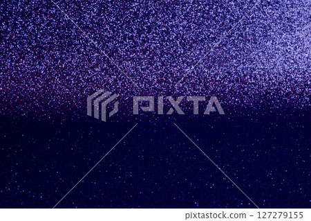 A blue background with purple glitter A blue background with purple glitter 127279155