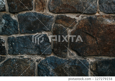 A wall made of stone with a blue and gray color 127279158