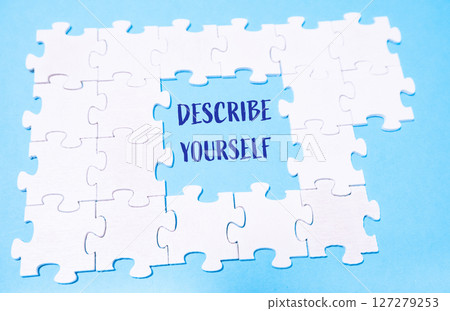 Puzzle with the words Describe yourself written in the middle 127279253