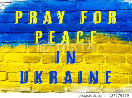 A blue and yellow sign that says pray for peace in Ukraine 127279279