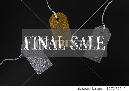 Black background with three tags that say Final Sale on it Black background with three tags that say Final Sale on it 127279341
