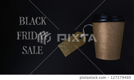 Coffee cup with a gold tag on it is on a black background with the words Black Coffee cup with a gold tag on it is on a black background with the words Black 127279489