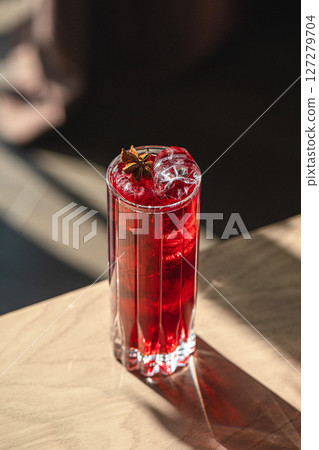Highball glass of fresh red cocktail with mint Highball glass of fresh red cocktail with mint 127279704
