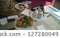 A unique afternoon tea set with a mini burger 127280049
