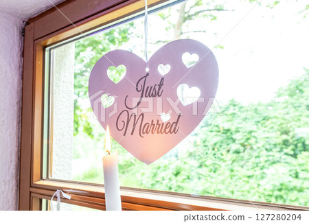 Wedding decor. Close up of a wedding table decoration with white and pink flowers and candles Wedding floristic concept Wedding decor. Close up of a wedding table decoration with white and pink flowers and candles Wedding floristic concept 127280204