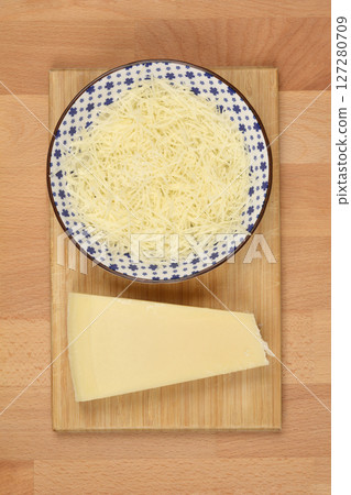 Finely grated cheese 127280709