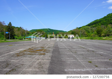 Large parking lot at Yubari Coal History Village 127280756