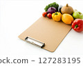 Fresh Produce Arrangement on Clipboard for Shopping and Wishlist Creation 127283195
