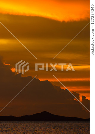 sunset over sea 127284349
