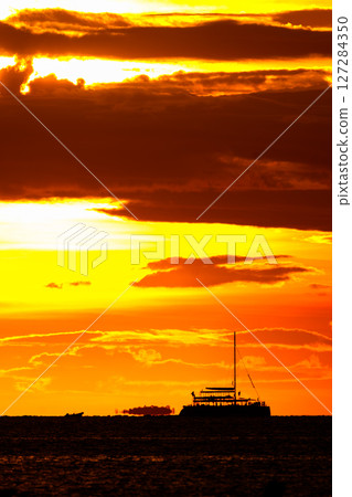sunset sky with clouds and sun light sunset sky with clouds and sun light 127284350