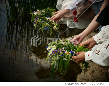 Midsummer solstice holiday with flower wreath 127284565