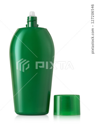Green plastic squeeze bottle with open flip cap dispenser isolated on white background for packaging or product design Green plastic squeeze bottle with open flip cap dispenser isolated on white background for packaging or product design 127286546