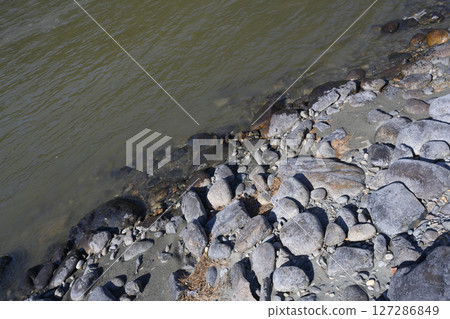 The rocky shore of the Katun River in the Altai Mountains The rocky shore of the Katun River in the Altai Mountains 127286849