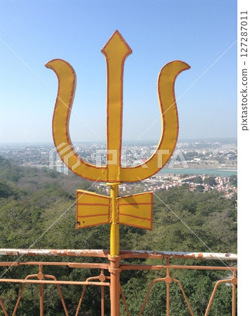 Trident or Trishula of Shiva at hindu temple in Rishikesh, India. Trident or Trishula of Shiva at hindu temple in Rishikesh, India. 127287011