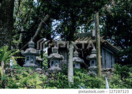 Kabira Kannon-do and stone lanterns in the forest of Ishigaki Island 127287123