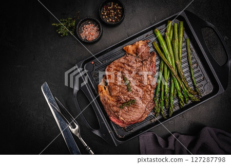 Beef grill steak with green asparagus 127287798