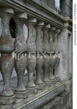Dirty old vintage concrete balcony columns. the last century Dirty old vintage concrete balcony columns. the last century 127288080
