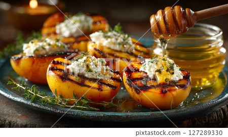 Grilled Peaches with Goat Cheese and Honey 127289330