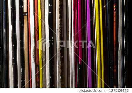 Close Up Standing Vinyl (LP) Records Colorful Background Close Up Standing Vinyl (LP) Records Colorful Background 127289462