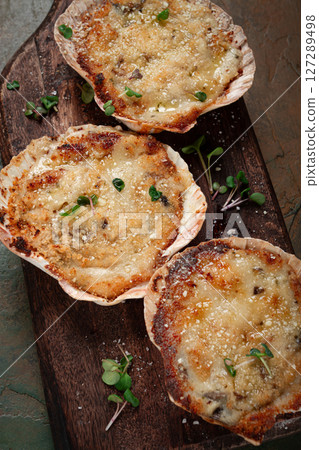 scallop shells, stuffed, baked with cheese, in the oven, julienne with scallops, scallop shells, stuffed, baked with cheese, in the oven, julienne with scallops, 127289498