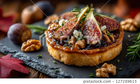 Sweet Fig and Walnut Tart with Goat Cheese 127289613