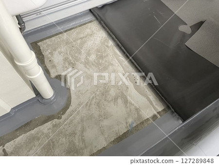 Re-covering long sheets on balconies of condominiums Re-covering long sheets on balconies of condominiums 127289848