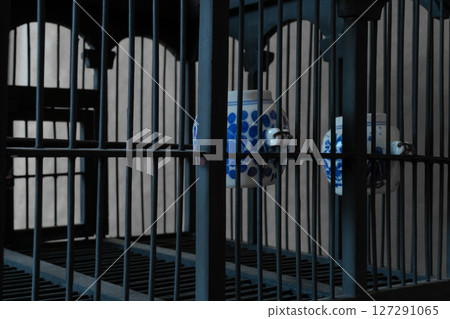 Vintage and Old Wooden Bird Cage with Water Cups Vintage and Old Wooden Bird Cage with Water Cups 127291065