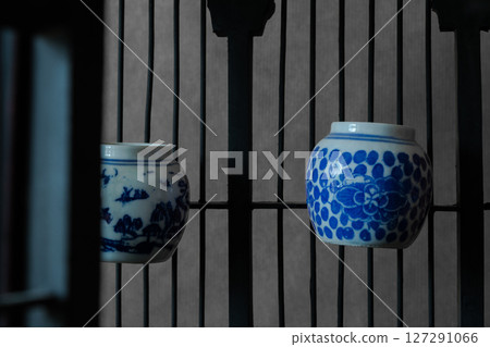 Vintage and Old Wooden Bird Cage with Water Cups 127291066