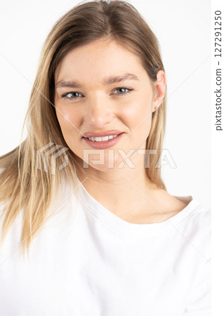 Beautiful woman close-up studio portrait Beautiful woman close-up studio portrait 127291250