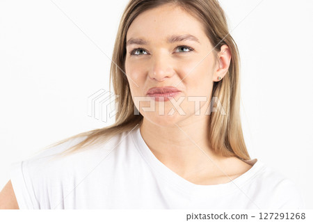 Beautiful happy woman close-up studio portrait Beautiful happy woman close-up studio portrait 127291268