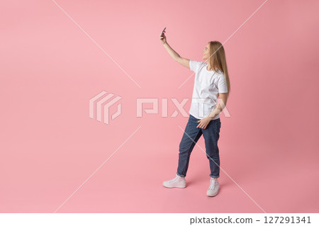 Young Woman Taking a Selfie Young Woman Taking a Selfie 127291341