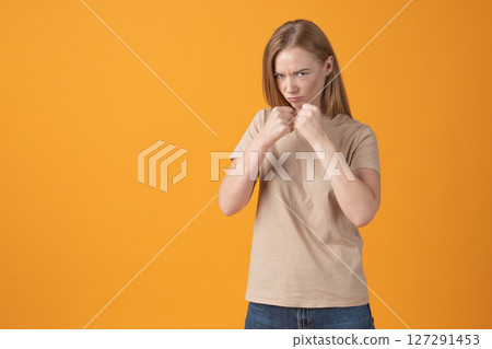 Young Woman in Defensive Stance 127291453