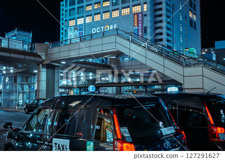 Taxis waiting for passengers at Hachioji Station (in front of the station) at night Taxis waiting for passengers at Hachioji Station (in front of the station) at night 127291627