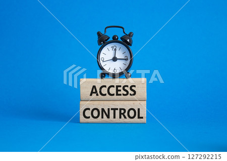 Access Control symbol. Concept words Access Control on wooden blocks. Beautiful blue background with alarm clock. Business and Access Control concept. Copy space. Access Control symbol. Concept words Access Control on wooden blocks. Beautiful blue background with alarm clock. Business and Access Control concept. Copy space. 127292215