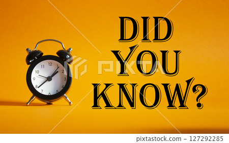 Did you know symbol. Beautiful orange background with alarm clock. Business and Did you know concept. Copy space. Did you know symbol. Beautiful orange background with alarm clock. Business and Did you know concept. Copy space. 127292285