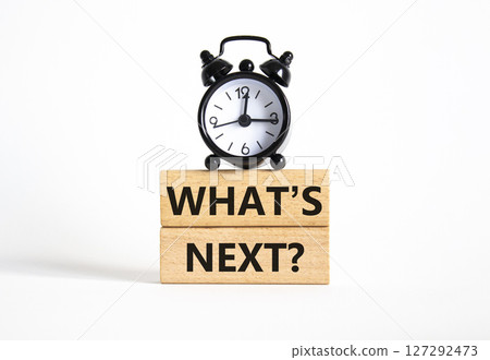What is next symbol. Concept words What is next on wooden blocks. Beautiful white background with alarm clock. Business and What is next concept. Copy space. What is next symbol. Concept words What is next on wooden blocks. Beautiful white background with alarm clock. Business and What is next concept. Copy space. 127292473