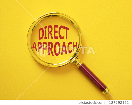 Direct Approach symbol. Magnifying glass with words Direct Approach. Beautiful yellow background. Business and Direct Approach concept. Copy space. 127292521