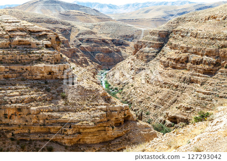 Stunning desert landscape with captivating layered rock formations 127293042