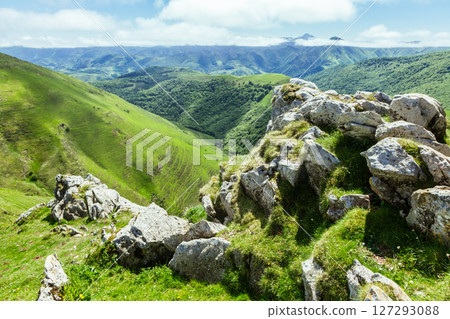 Stunning green hills of the French Pyrenees along the Camino de Santiago journey Stunning green hills of the French Pyrenees along the Camino de Santiago journey 127293088