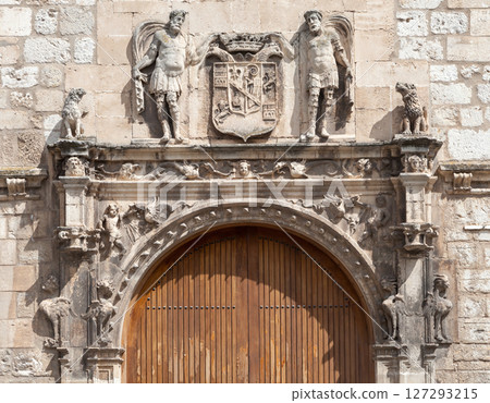 Historic door and architectural details in Burgos, Spain showcasing local craftsmanship Historic door and architectural details in Burgos, Spain showcasing local craftsmanship 127293215
