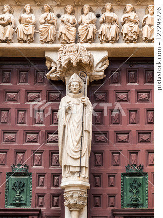 Stone carvings of a saint adorning the entrance to the Burgos Cathedral Stone carvings of a saint adorning the entrance to the Burgos Cathedral 127293226