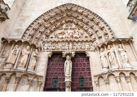 Gothic architecture of the Cathedral in Burgos, Spain showcasing intricate stone carvings 127293228