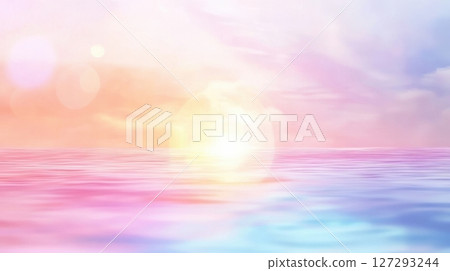 Artistic blurred sunrise scene with pastel hues, perfect for serene landscapes, backgrounds, and creative designs. 127293244