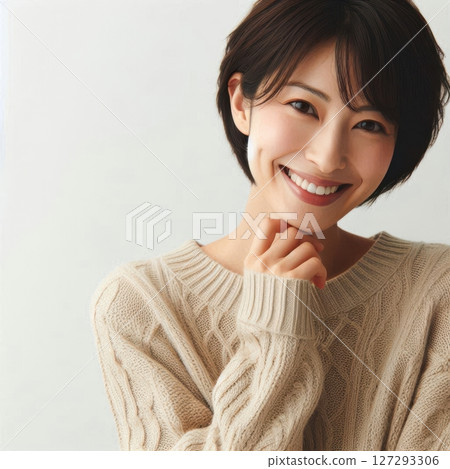 Professional photography of a Japanese woman in a beige sweater, candid and charming, smiling with hand on chin, white studio background. 127293306
