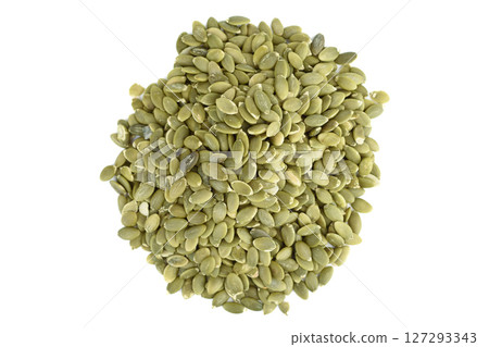 Top view of pile of peeled pumpkin seeds isolated on white background. 127293343