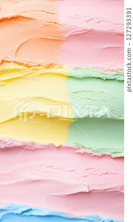 Top view of colorful ice cream in waffle cones with a vibrant background, captured in close-up, high-resolution photography for commercial and promotional use. 127293391