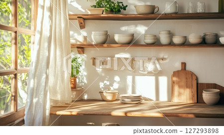 Cozy farmhouse kitchen with vintage ceramics and natural light. 127293898